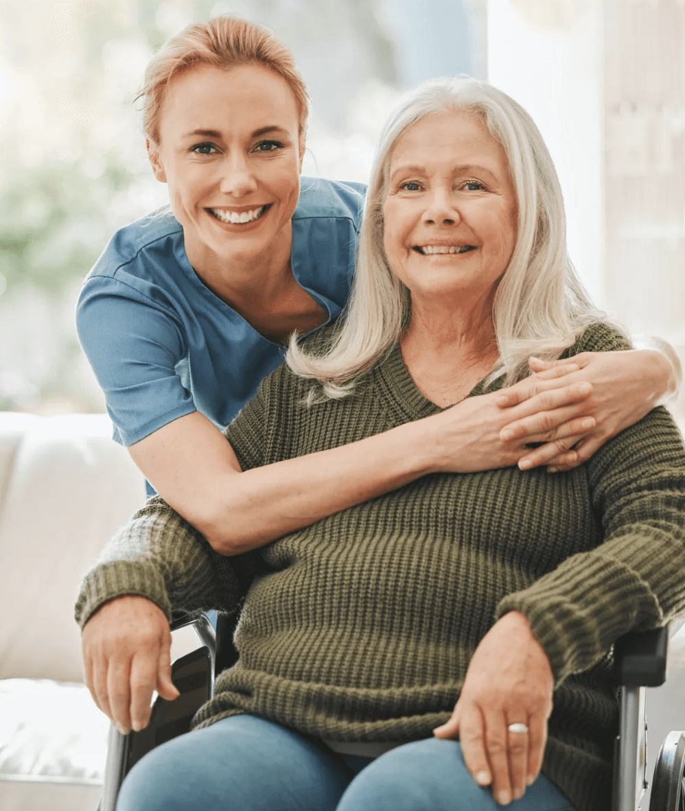 Nurse and senior woman smiling